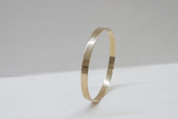 Esclava satinada en oro 9 kilates (5 mm.)