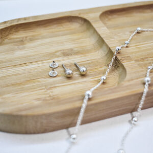 Conjunto: cadena con bochitas de plata + caravanas bochitas