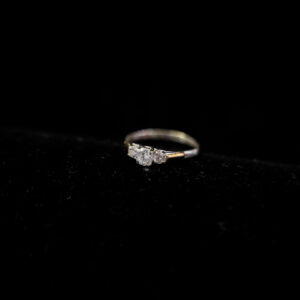 Anillo tres Circonias en plata y oro