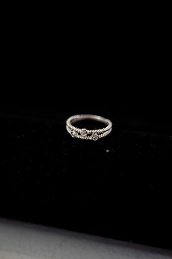 Anillo de plata triple Circonia